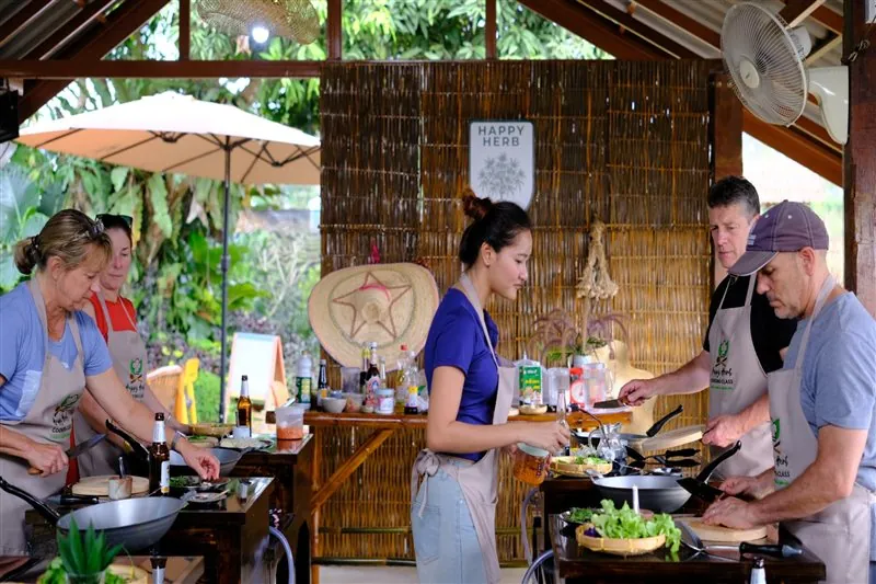 Guests cooking side by side with their local instructor