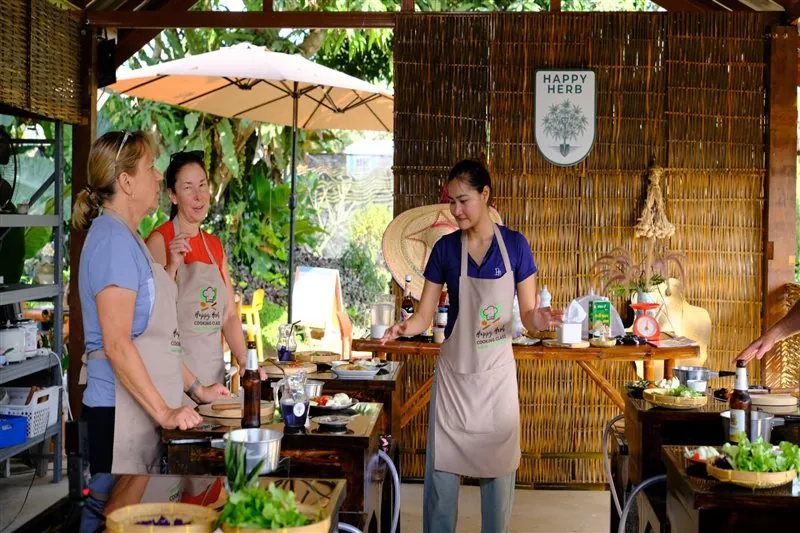 Garden guide explaining ingredients before guests begin cooking
