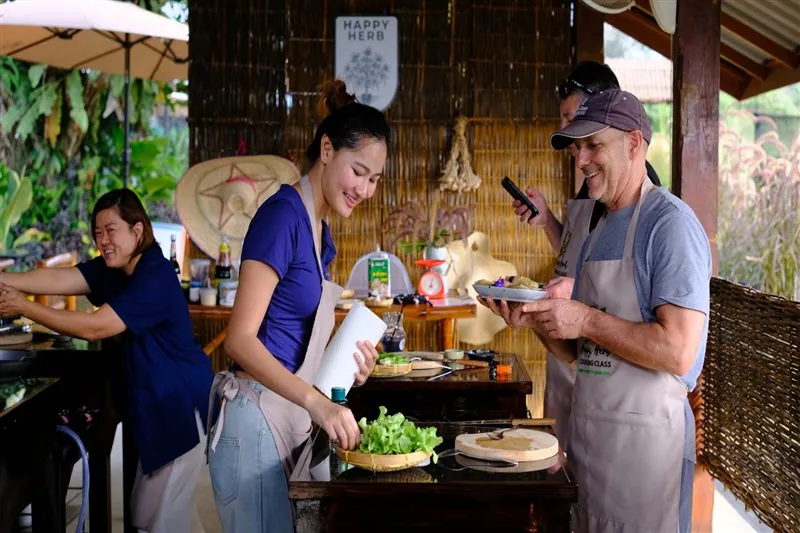 Guest preparing ingredients for a traditional Thai recipe