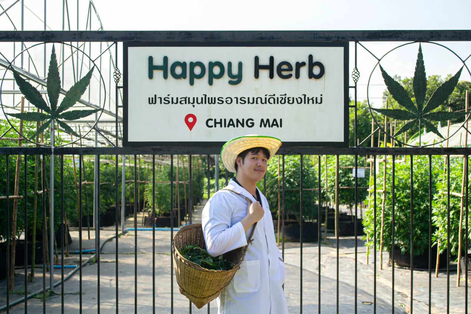Happy Herb guide welcoming guests at the farm entrance