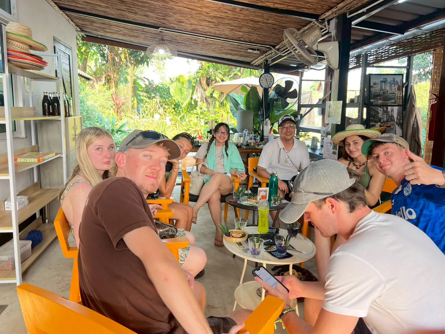 Tour group relaxing together during farm hospitality